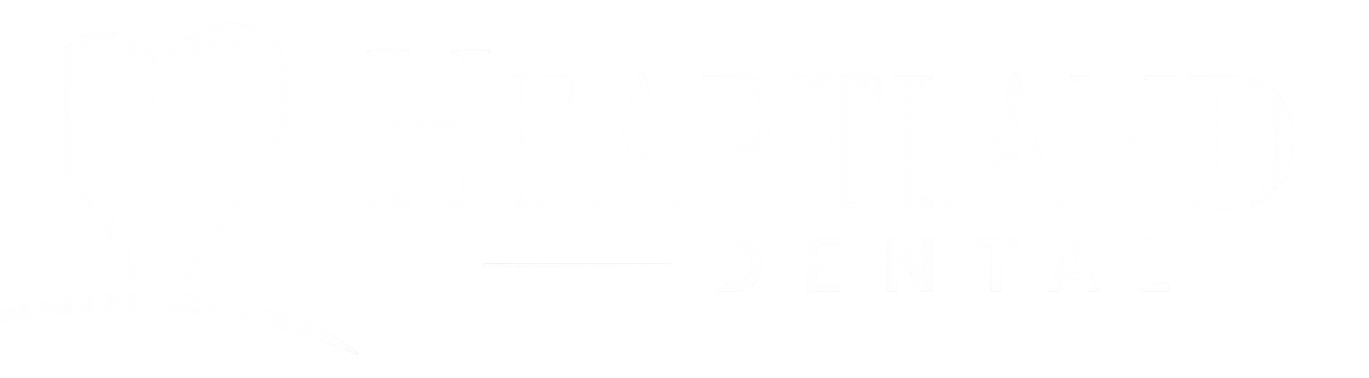 Heartland dental logo white